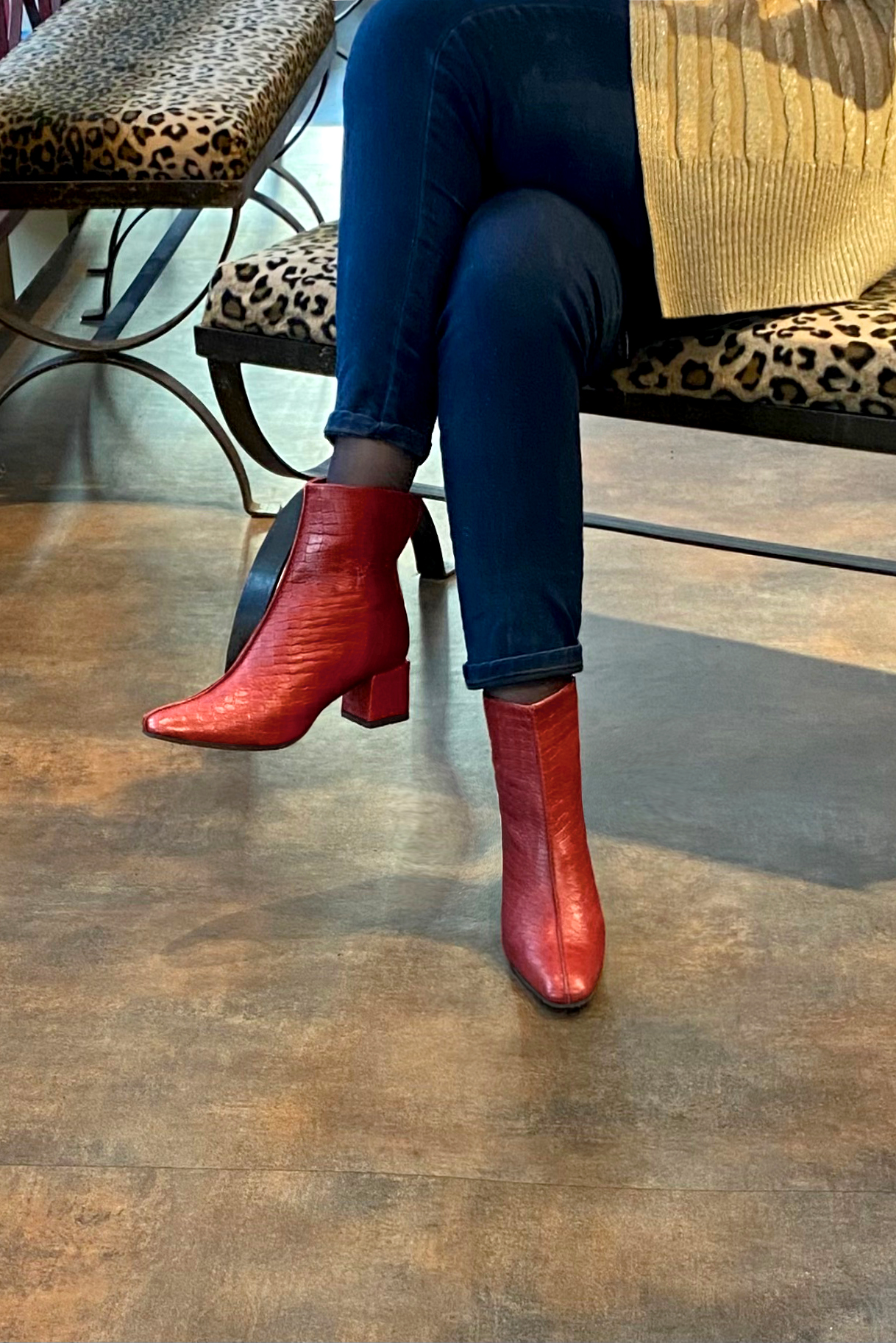 Scarlet red women's ankle boots with a zip at the back. Square toe. Medium block heels. Worn view - Florence KOOIJMAN